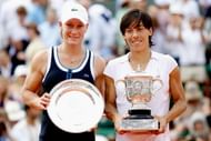 Francesca Schiavone and Samantha Stosur pose with their trophies after the women's singles final match between Francesca Schiavone of Italy and Samantha Stosur of Australia on day fourteen of the French Open at Roland Garros on June 5, 2010 in Paris, France. (Getty Images)